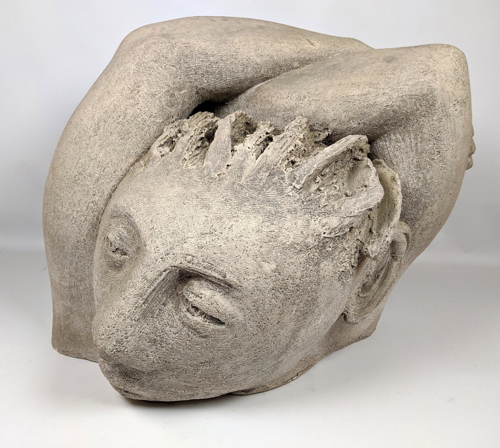Pottery Garden Sculpture of Windswept Figure. Artist de: Pottery Garden Sculpture of Windswept Figure. Artist design Unsigned. -- Dimensions: H: 19 inches: W: 23 inches: D: 18 inches ---