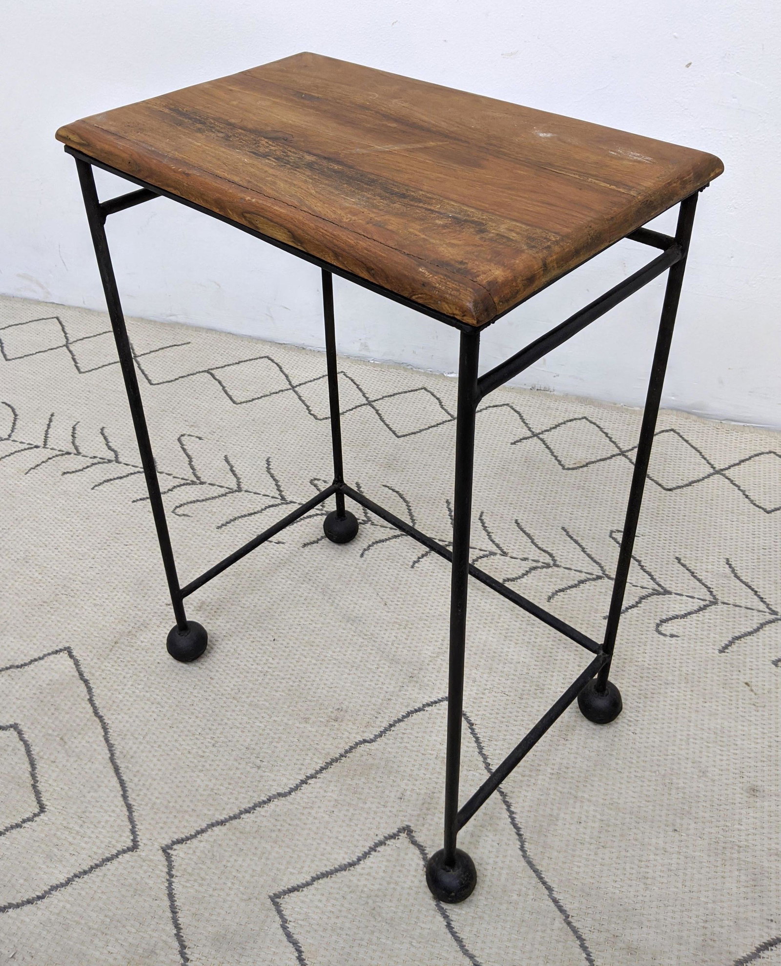 Mid Century Modern Iron and wood Stand Table. Wood bal: Mid Century Modern Iron and wood Stand Table. Wood ball feet. -- Dimensions: H: 27 inches: W: 18 inches: D: 11.5 inches ---