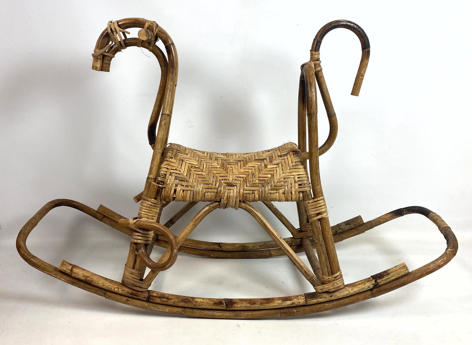 Franco Albini Style Rocking Horse. Woven Rattan.: Franco Albini Style Rocking Horse. Woven Rattan.-- Dimensions: H: 27 inches: W: 38 inches: D: 15 inches ---