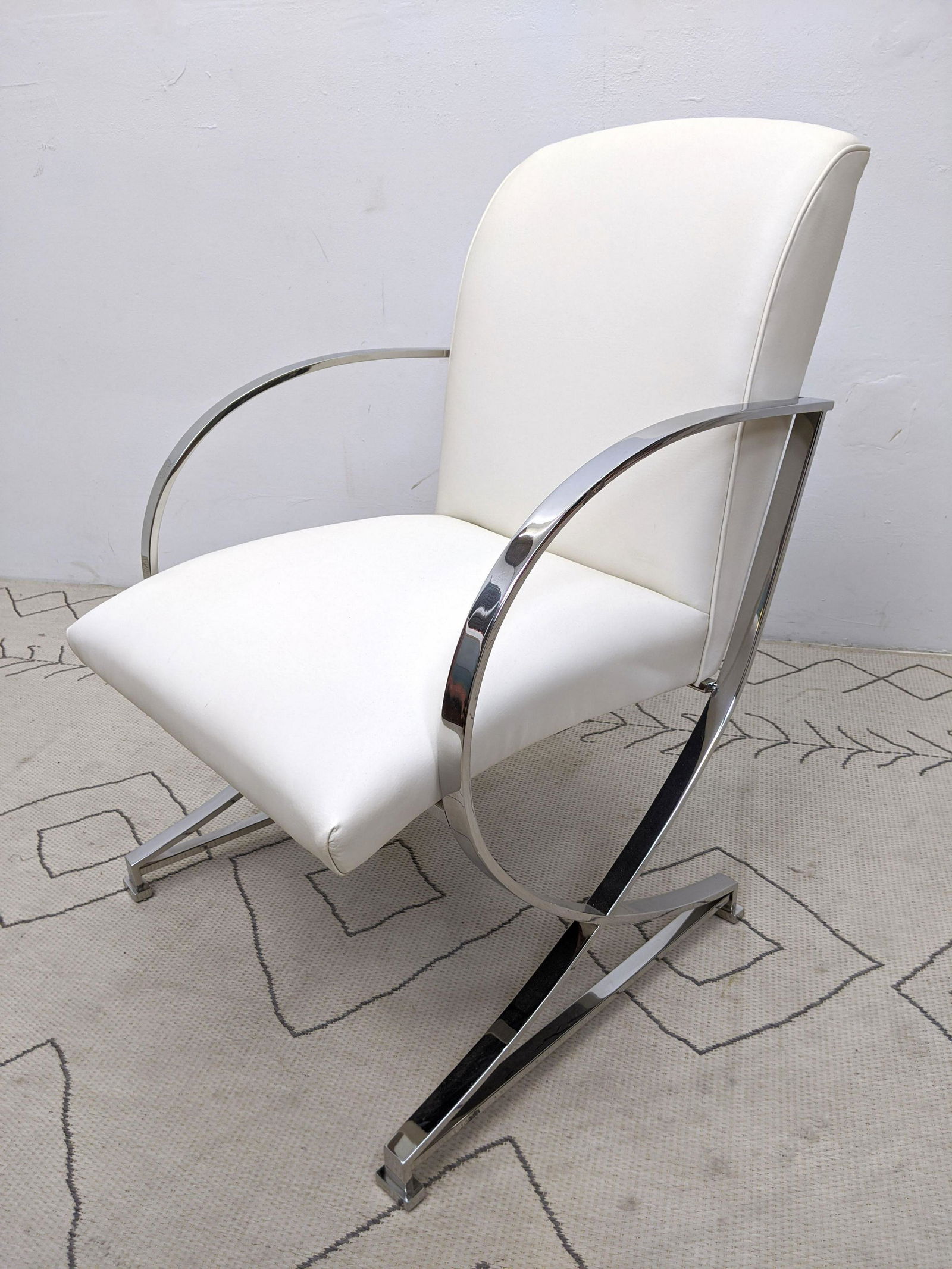 Leather Chrome Frame Lounge Chair. Curved arms. (1 of 8)