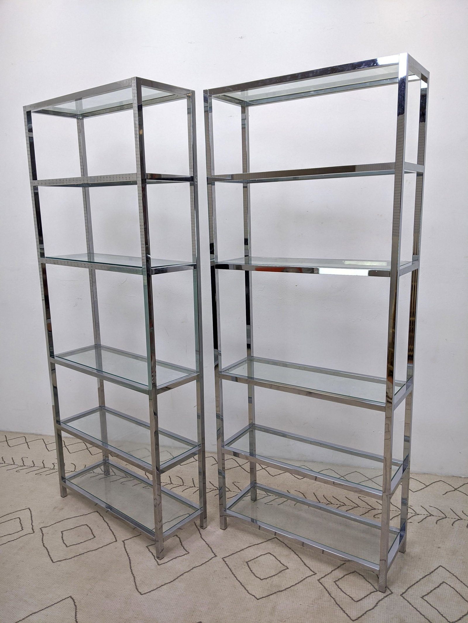 Pair Tall Chrome and Glass Etagere Shelf Units.: Pair Tall Chrome and Glass Etagere Shelf Units. -- Dimensions: H: 79 inches: W: 32 inches: D: 12 inches ---