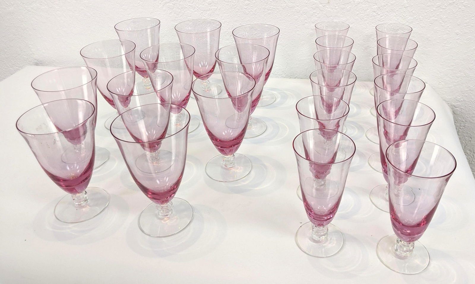 23pc Pink Crystal Fluted Stemware Glasses. Clear base. (1 of 7)