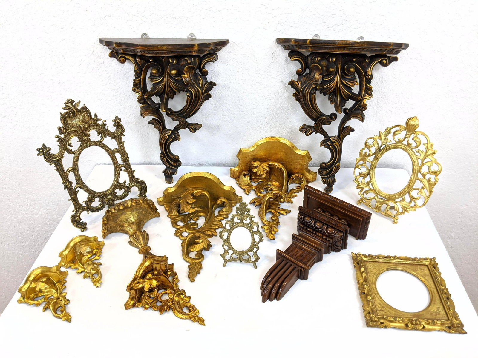 13pc Mixed Wall Mount Bracket Shelf, Ornate Picture Fra: 13pc Mixed Wall Mount Bracket Shelf, Ornate Picture Frames Lot. 2 pr of wall bracket shelves; assorted gilt and plain wood singles.-- Dimensions: H: 16 inches: W: 13.5 inches: D: 5 inches ---