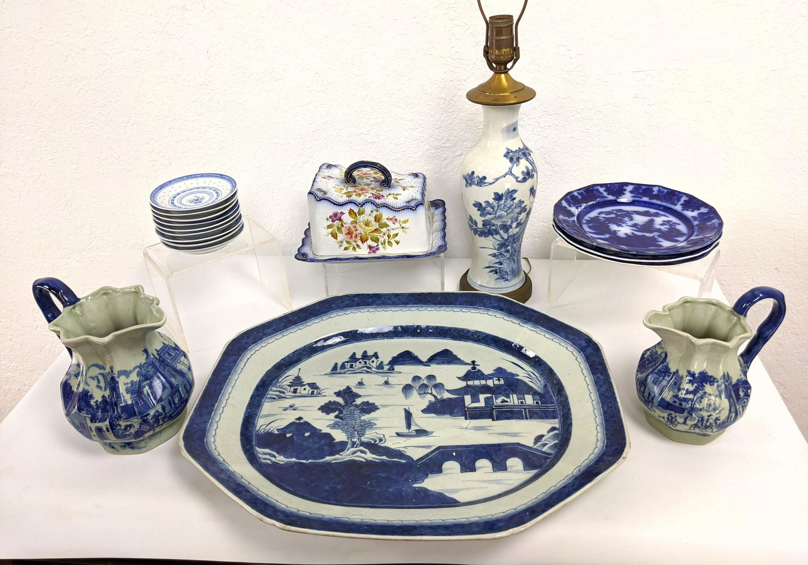 17pc Mostly Blue & White Pottery Porcelain Lot. Mostly: 17pc Mostly Blue & White Pottery Porcelain Lot. Mostly Chinese. STOKES ON TRENT Cheese dome. 2 blue rimmed bowls. W ADAMS ÒShanghaiÓ flow blue ironstone plate. Set 9 Chinese small dishes rice design
