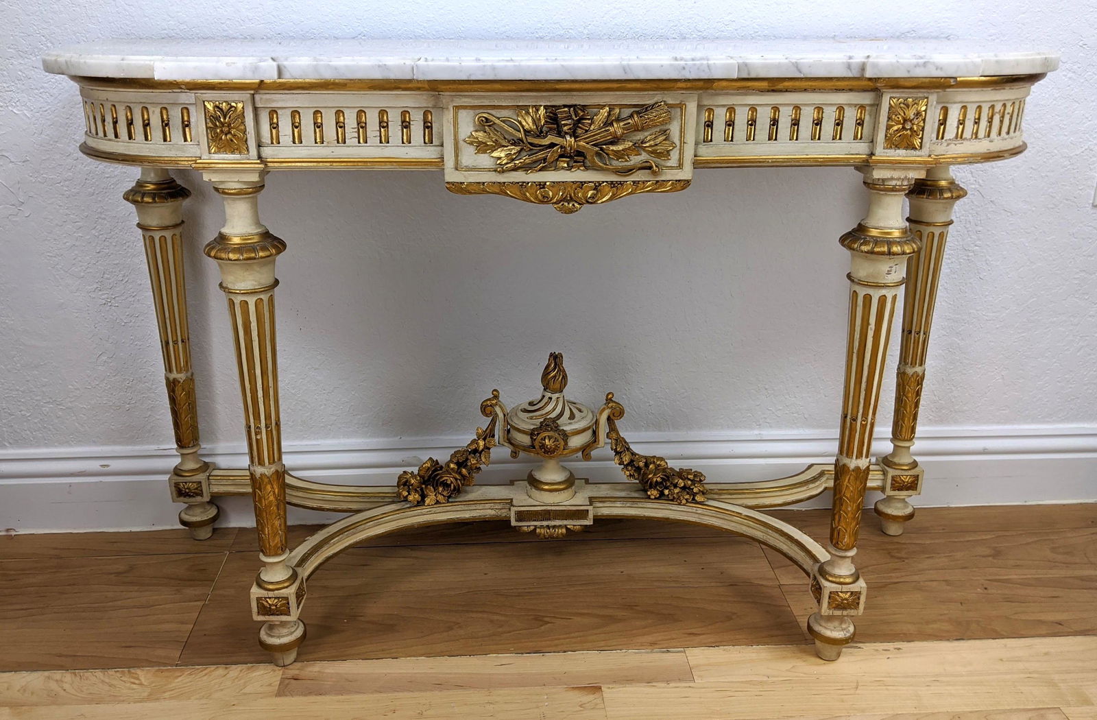 Large Marble Top French Style Painted Hall Console Tabl: Large Marble Top French Style Painted Hall Console Table. Hand painted base with gilt painted highlights. Fancy carved stretcher-- Dimensions: H: 33 inches: W: 53 inches: D: 18.5 inches ---