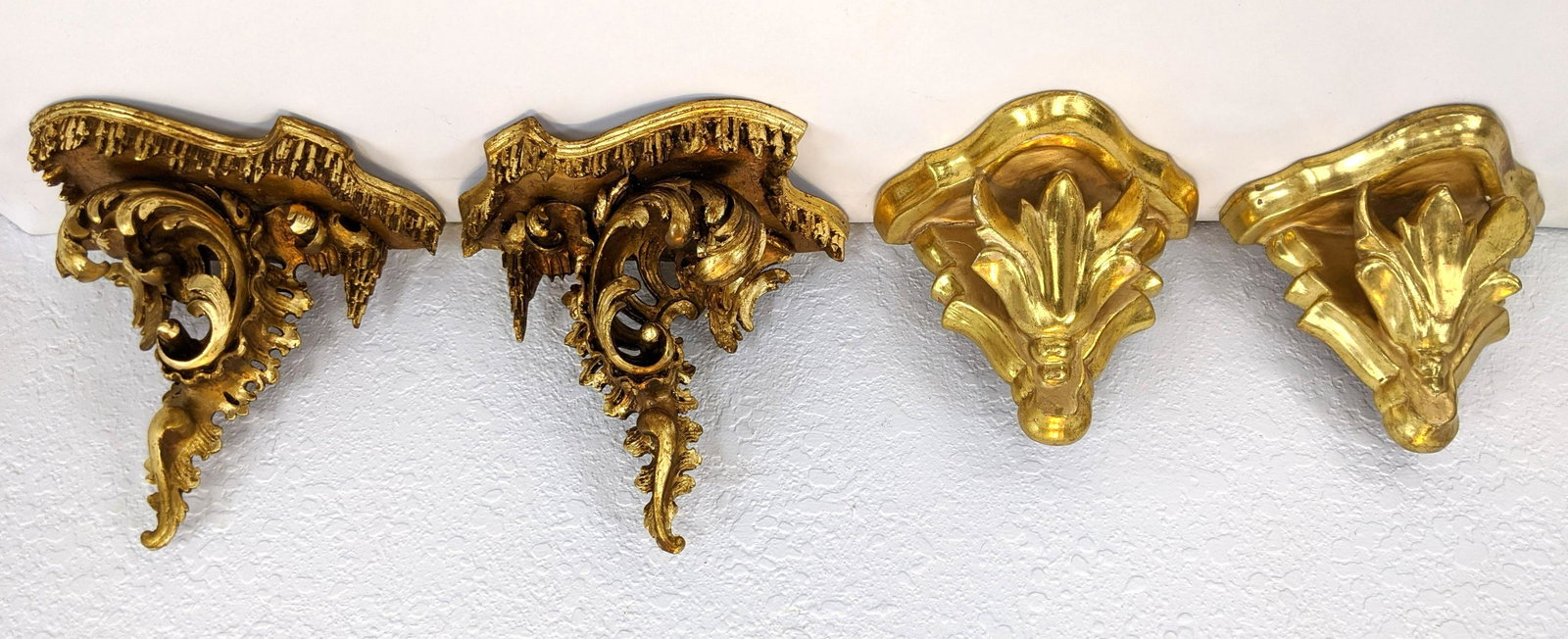 2 Pair Gold Gilt Wood Wall Shelf Brackets. One ornately: 2 Pair Gold Gilt Wood Wall Shelf Brackets. One ornately carved-- Dimensions: H: 7.5 inches: W: 9 inches: D: 4.25 inches ---