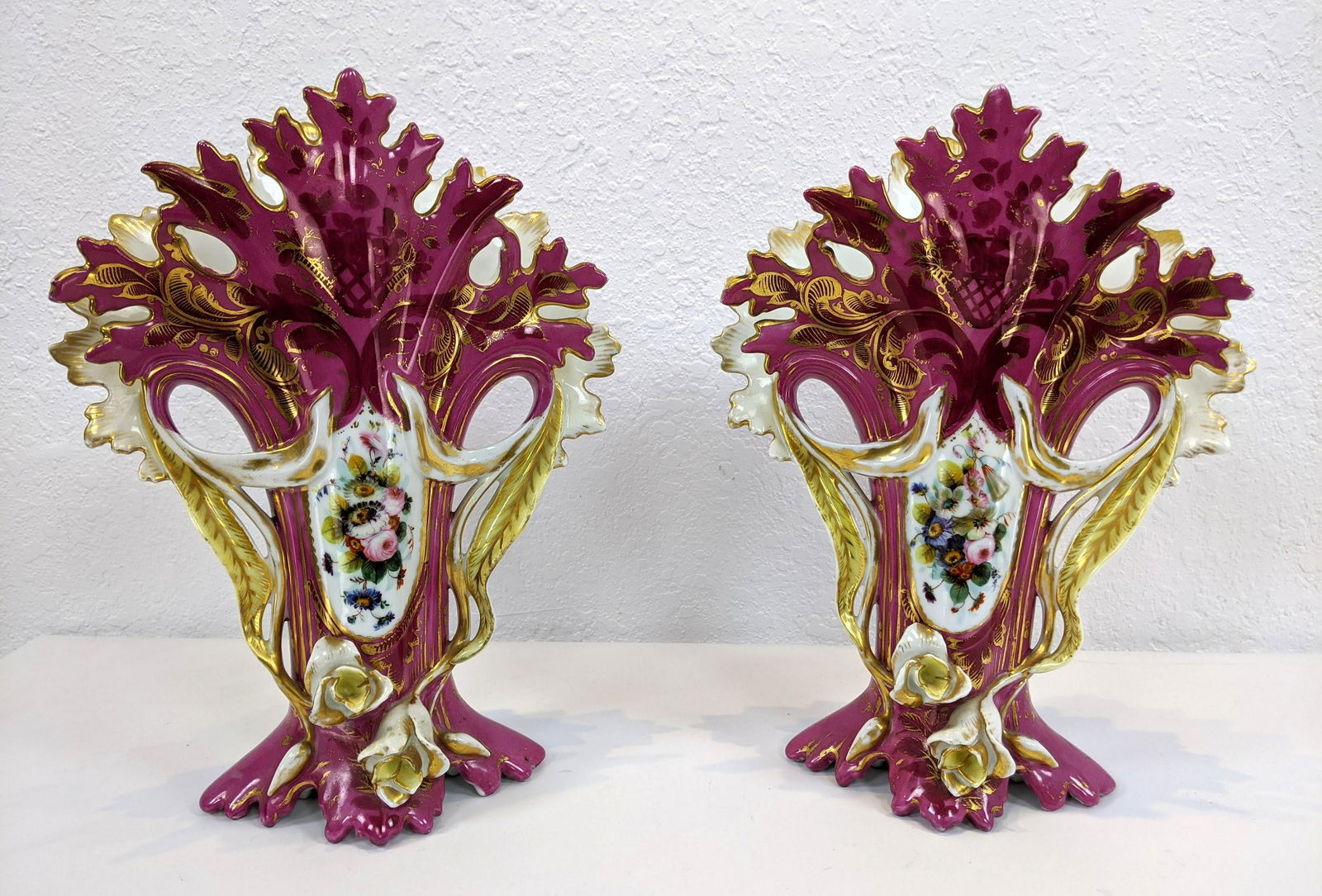 Pr Old Paris Porcelain Bright Pink Flared Vases. Applie: Pr Old Paris Porcelain Bright Pink Flared Vases. Applied leaf and flower details. Marked with a -- Dimensions: H: 14 inches: W: 11 inches: D: 5.5 inches ---