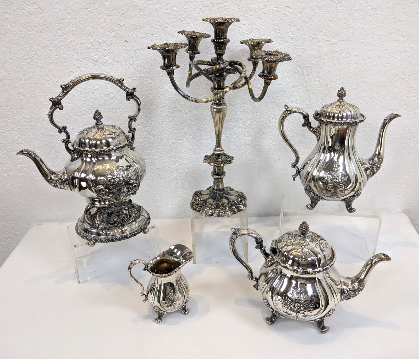5pc Silver Plate Lot. INTERNATIONAL SILVER ÔDu BarryÕ 4: 5pc Silver Plate Lot. INTERNATIONAL SILVER ÔDu BarryÕ 4 piece fancy tea coffee service. Tilting coffee pot, coffee pot, tea pot and creamer. 4 arm candelabr-- Dimensions: H: 15.75 inches: W: 10 inch
