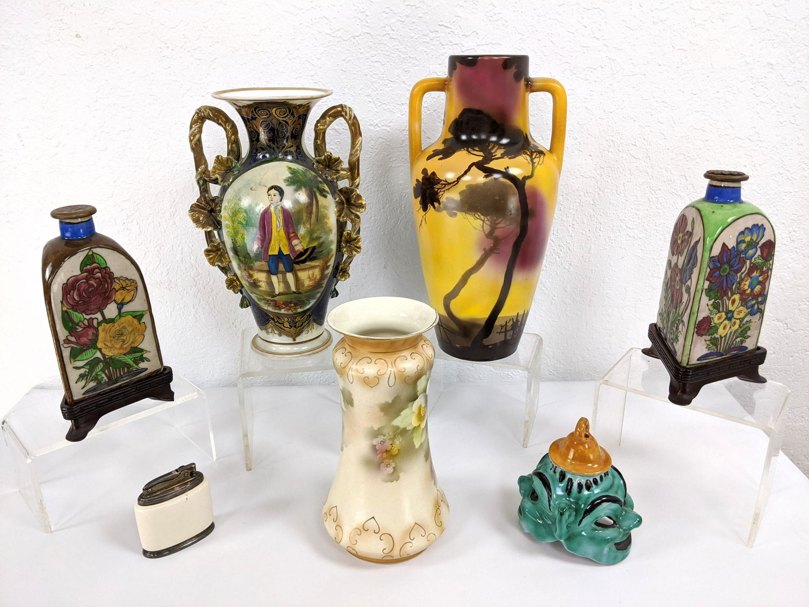 7pc European Pottery Lot. Hand painted vase with silhou: 7pc European Pottery Lot. Hand painted vase with silhouette design signed L Berty. Pr Persian stoppered bottles. Italian 2 sided face piece. CROWNFORD English vase-- Dimensions: H: 13.5 inches: W: 7 i