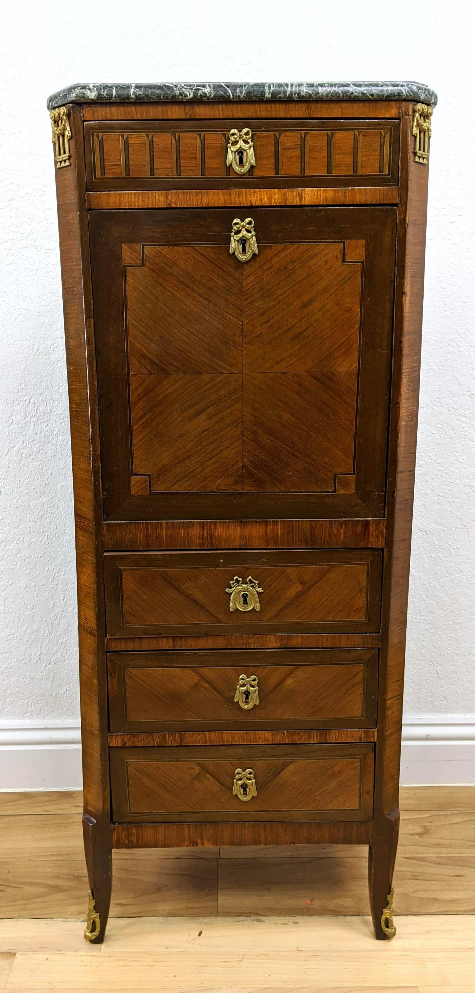 French Marquetry Secretaire Abattant Writing Desk. Gree: French Marquetry Secretaire Abattant Writing Desk. Green marble top. Drop down desk compartment over 3 drawers. Ormolu mounts-- Dimensions: H: 49.5 inches: W: 20.25 inches: D: 12.25 inches ---