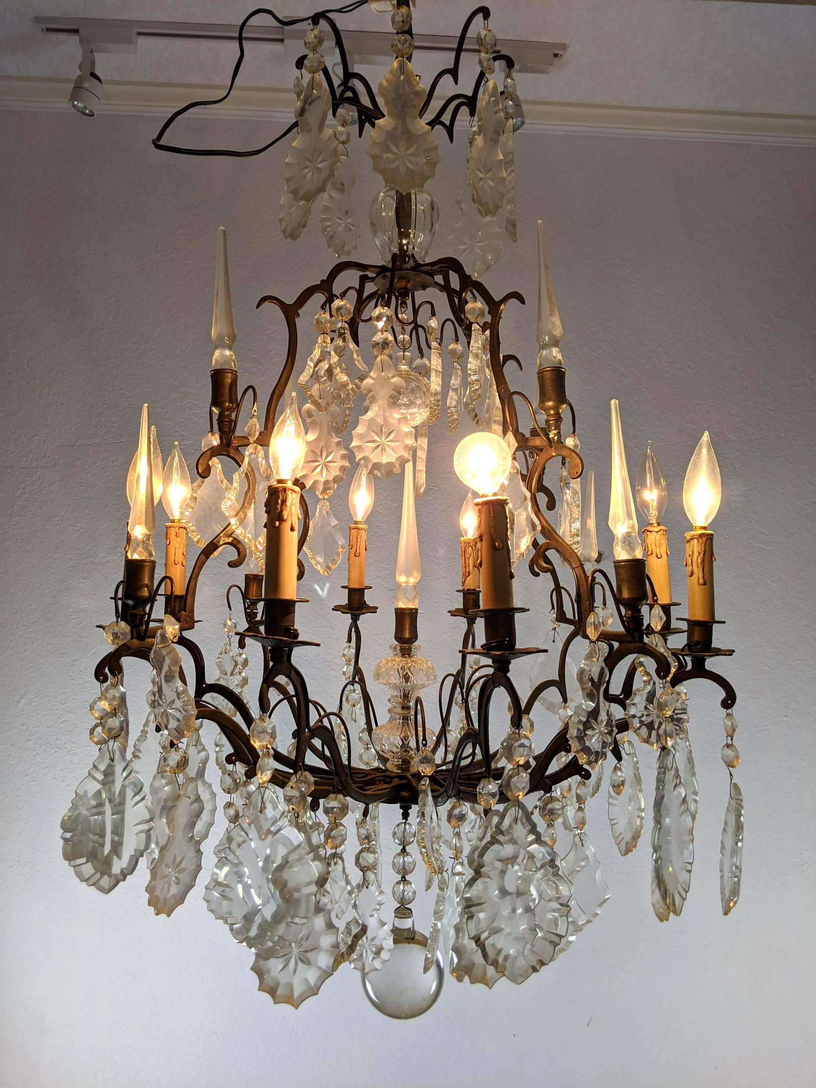 Dark Bronze tone Metal Crystal Prism Hanging Chandelier: Dark Bronze tone Metal Crystal Prism Hanging Chandelier. 8 arm candle lights. Dark Metal Crystal Prism Hanging Chandelier. 8 arm candle lights. -- Dimensions: H: 38 inches: W: 22.5 inches: D: 22.5 inc