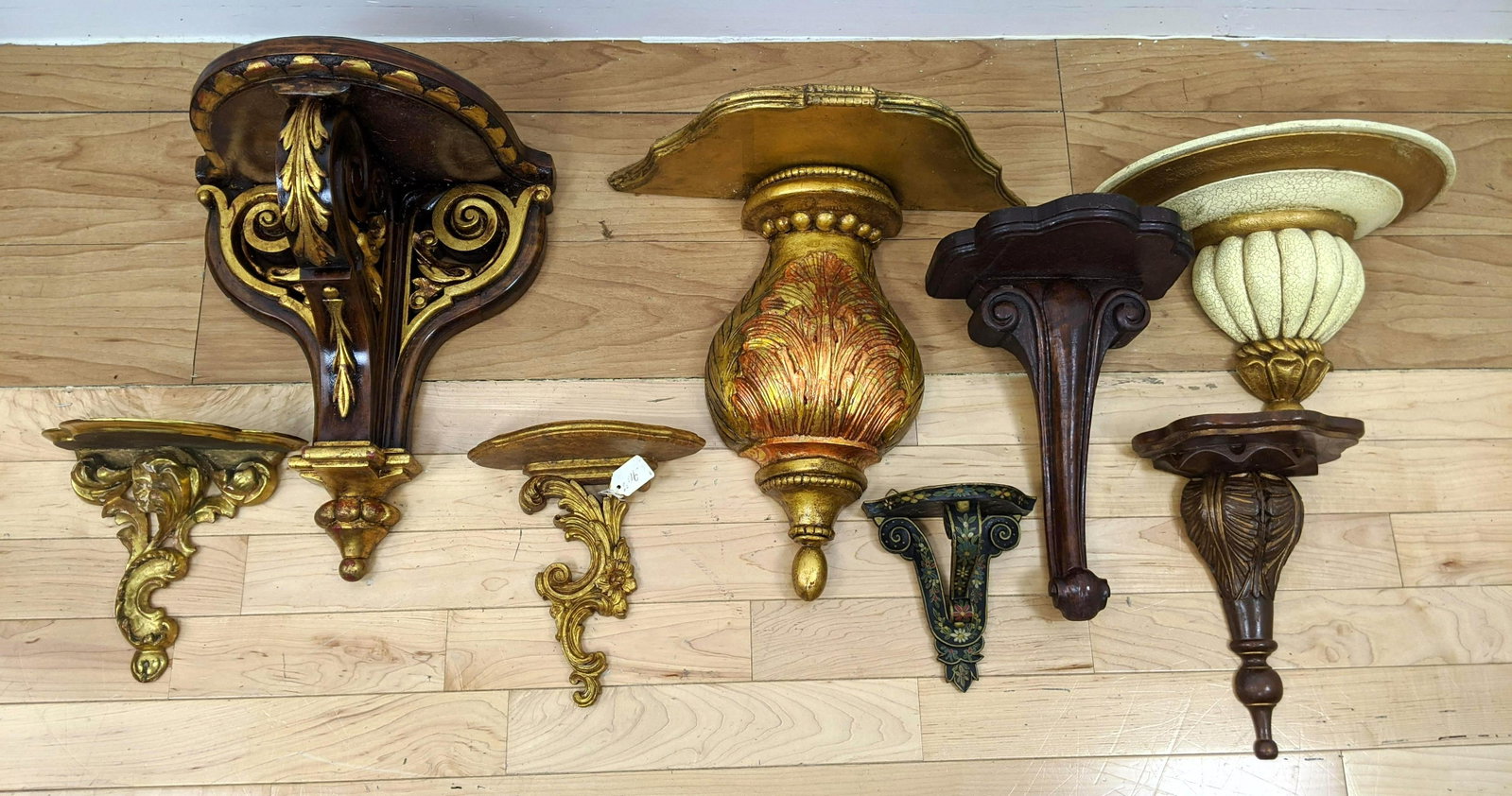 8 Decorative Brackets Wall Shelves. Some gilt. One ebon: 8 Decorative Brackets Wall Shelves. Some gilt. One ebonized with inlay. Some wood.-- Dimensions: ---