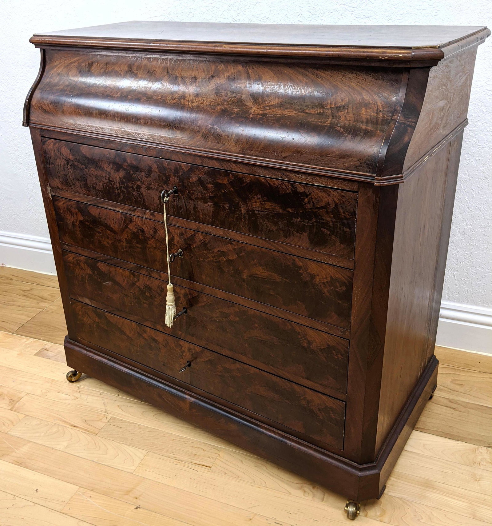 Flame Mahogany Antique Mechanical Wash Stand Dresser. T: Flame Mahogany Antique Mechanical Wash Stand Dresser. Top flips up to expose marble lined area with back mirror.-- Dimensions: H: 38 inches: W: 40 inches: D: 19.5 inches ---