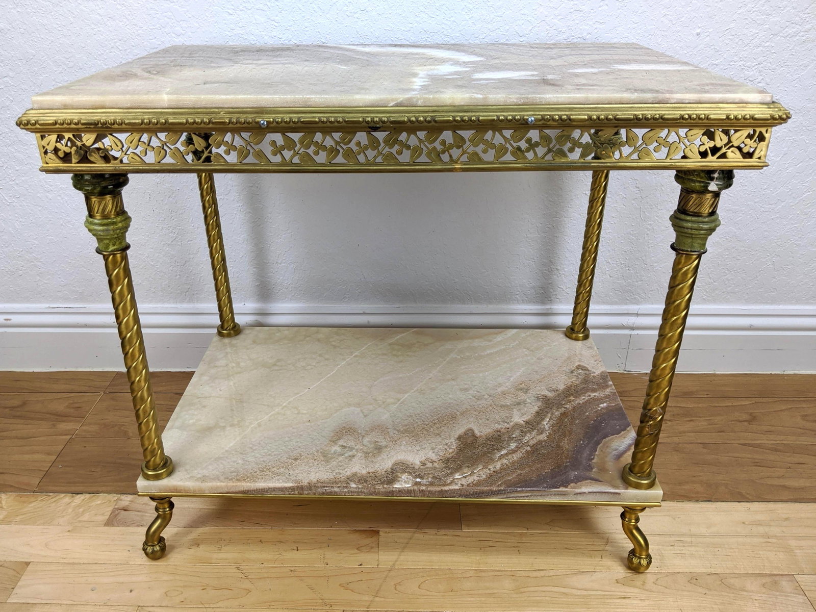 Onyx Top Cast Brass Hall Console Sofa Table. Twisted co: Onyx Top Cast Brass Hall Console Sofa Table. Twisted column supports with green stone capitols. 2 levels of figured onyx-- Dimensions: H: 26.75 inches: W: 31.25 inches: D: 21 inches ---