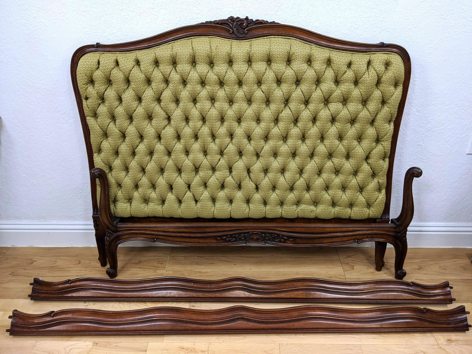 Upholstered Headboard Carved French Style Bed. Low foot: Upholstered Headboard Carved French Style Bed. Low footboard. Decorative carved wood rails. Mattress area width 56Ó, depth 81.5-- Dimensions: H: 48.5 inches: W: 57.5 inches: D: 81.5 inches ---