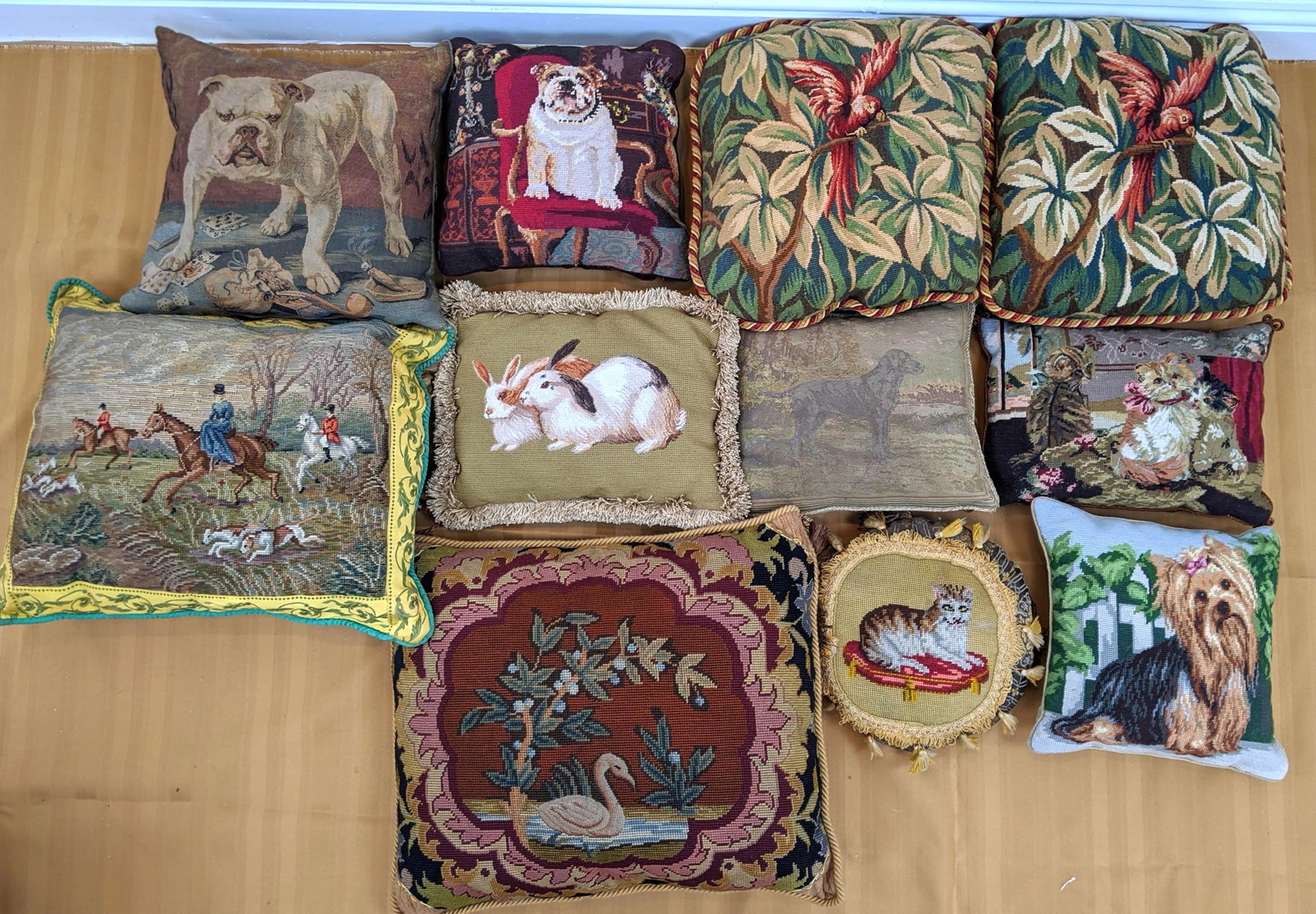 Collection of 11 Custom Animal Pillows. Pr Killim parro: Collection of 11 Custom Animal Pillows. Pr Killim parrots. Boxers, dogs, rabbits, cats, hunt scene, etc. Needlepoint and tapestry. Largest is 19x2-- Dimensions: H: 19 inches: W: 22 inches ---