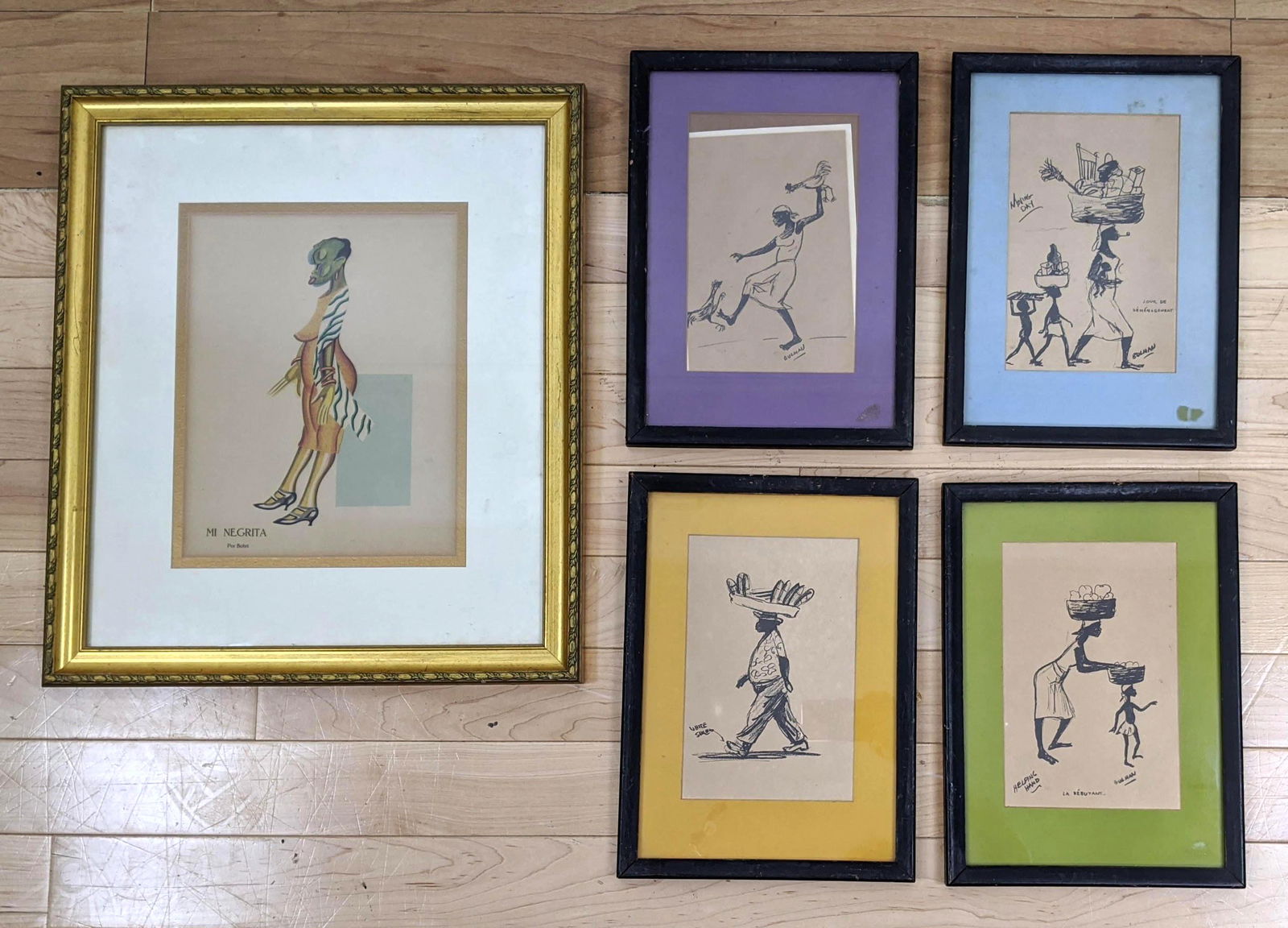 5pc Lot Prints. Set of 4 Lithographic Prints of island: 5pc Lot Prints. Set of 4 Lithographic Prints of island portraits. Probably Haitian. 3 signed BULMAN. One ÒMi Negrita por BoletÓ print-- Dimensions: H: 11.25 inches: W: 8.75 inches ---
