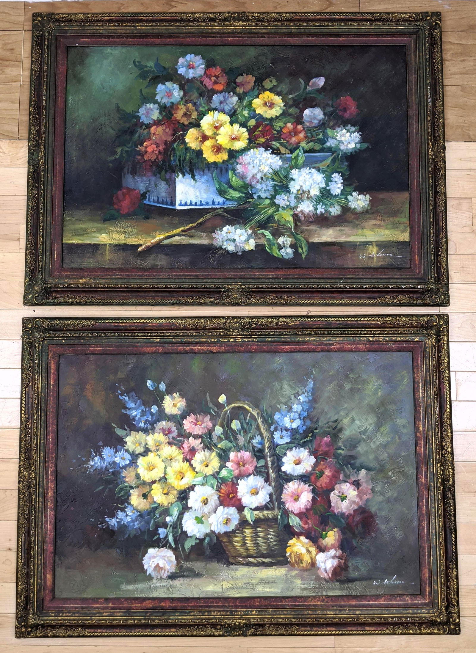 2pc W ADAM Paintings of Flowers in Baskets, painting on: 2pc W ADAM Paintings of Flowers in Baskets, painting on canvas. Both signed. Both in fancy gilt frames-- Dimensions: H: 23.5 inches: W: 35.5 inches ---