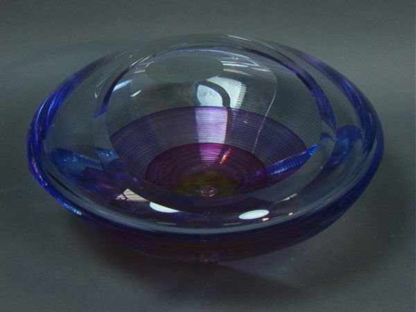 Michael David Kit Karbler Art Glass Vase Bowl. A: Michael David Kit Karbler Art Glass Vase Bowl. Angle Cut Vase with Internal Colored Swirls. Cot Open Panel. Signed and numbered 1087121 Dimensions: H: 5 inches: W: 11 inches Condition (General) Please