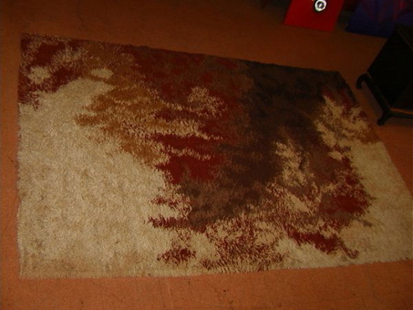 Ege Rya Denmark Vesuv Shag Area Rug. Browns Tans: Ege Rya Denmark Vesuv Shag Area Rug. Browns Tans and Rusts. Dimensions: : W: 72 inches: L: 108 inches Condition (General) Please contact us with specific questions about condition, not visible in the