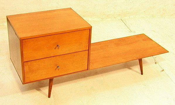 PAUL McCOBB Planner Group Table Cabinet: PAUL McCOBB Planner Group Table Cabinet. 2 Drawer Cabinet on placnk coffee table. Maple. Labeled. Dimensions: H: 26.5 inches: W: 60 inches: D: 18 inches Condition (General) Please contact us with spec