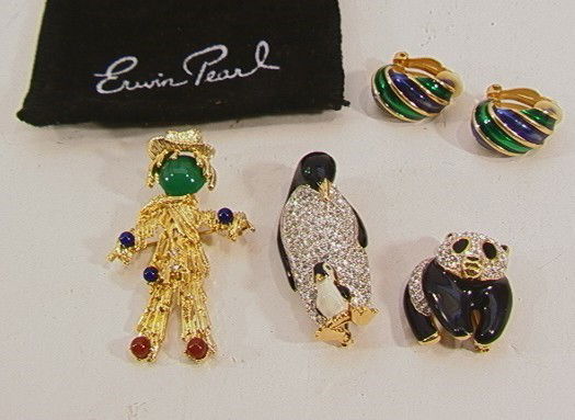 COSTUME JEWELRY FIGURAL ERWIN PEARL, PENGUIN. Sign: COSTUME JEWELRY FIGURAL ERWIN PEARL, PENGUIN. Signed Erwin Pearl scarecrow pin with colored stones, signed Erwin Pearl blue green enamel earrings, signed A & S black enamel panda pin , unsigned black