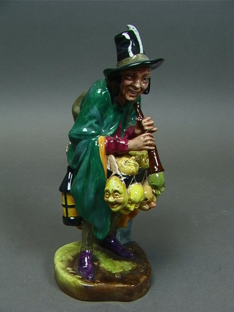 ROYAL DOULTON The Mask Seller HN2103. Mk'd.: ROYAL DOULTON The Mask Seller HN2103. Mk'd. Dimensions: H: 8.5 inches: W: 4 inches: D: 4 inches Condition (General) Please contact us with specific questions about condition, not visible in the photos