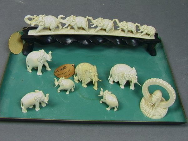 8 PCS Carved IVORY Elephants. Elephant Bridge wi: 8 PCS Carved IVORY Elephants. Elephant Bridge with stand. Elephant toothpick holder. Six individual elephants. Bridge is 9" long. 8 PCS. Dimensions: Condition (General) Please contact us with specific