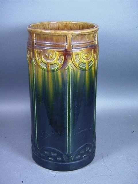 Majolica UMBRELLA STAND Nice colors and glaze. Un: Majolica UMBRELLA STAND Nice colors and glaze. Unmk'd. Dimensions: H: 20.5 inches: W: 9.75 inches: D: 9.75 inches Condition (General) Please contact us with specific questions about condition, not vis