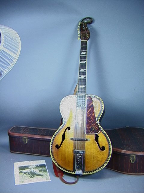 TEX RYAN Old Krafstman Guitar Mother of Pearl inl: TEX RYAN Old Krafstman Guitar Mother of Pearl inlay. Includes copy of Autographed photo from Tex Ryan playing this guitar. Dimensions: H: 42.5 inches: W: 16 inches Condition (General) Please contact u