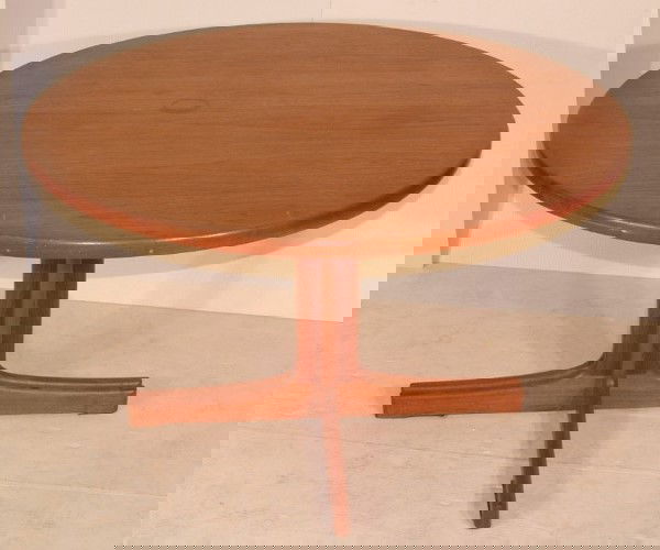 CARLSSON VETLANDA DINING TABLE CARLBRITE EKSELIUS.: CARLSSON VETLANDA DINING TABLE CARLBRITE EKSELIUS. Round Teak Dining Table w/ split pedestal base. Extends open to support two (2) 24 in. leaves. Marked on table runners. Dimensions: H: 28.5 inches: W