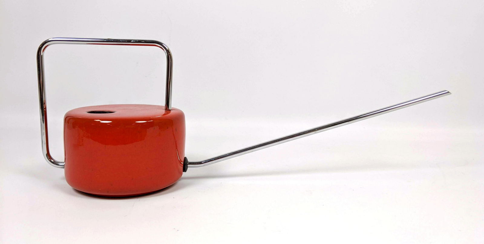 Vintage Modernist Design Red Enamel Watering Can: Great Modernist Design Watering Can. Red enamel with Chrome handle and spout. -- Dimensions: H: 6 inches: W: 17.5 inches: D: 5 inches ---