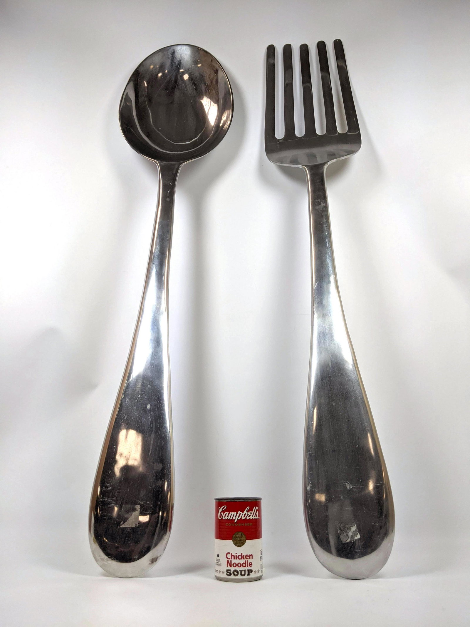 2pcs Oversized Spoon and Fork Wall Sculptures. Cast alu: 2pcs Oversized Spoon and Fork Wall Sculptures. Cast aluminum. -- Dimensions: H: 46 inches: W: 8.5 inches: D: 3 inches ---