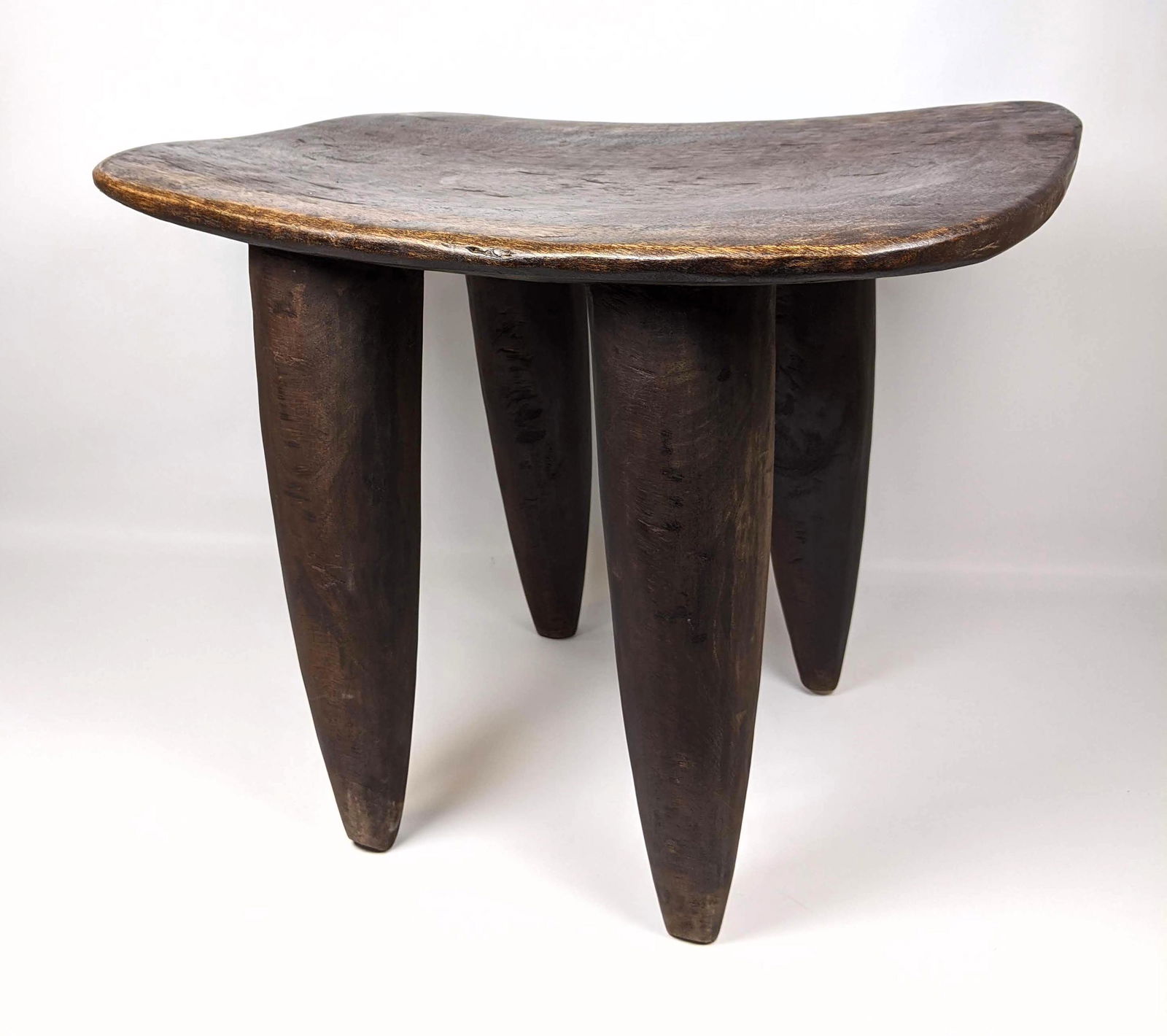 West African Senufo Bench Stool. Carved from one piece (1 of 8)