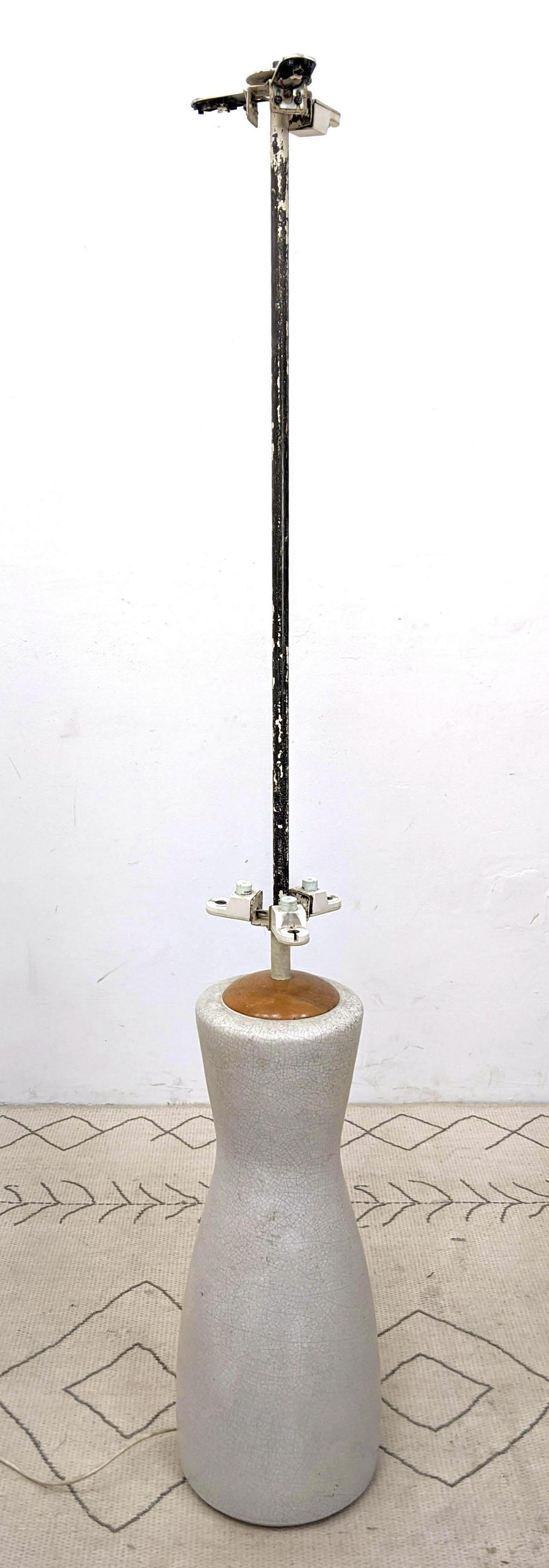 KARLSRUHE Pottery Floor Lamp. Pottery base with tall st: KARLSRUHE Pottery Floor Lamp. Pottery base with tall stem for shade. Shade Missing. Crackle Glaze.-- Dimensions: H: 73 inches: W: 8 inches: D: 8 inches ---