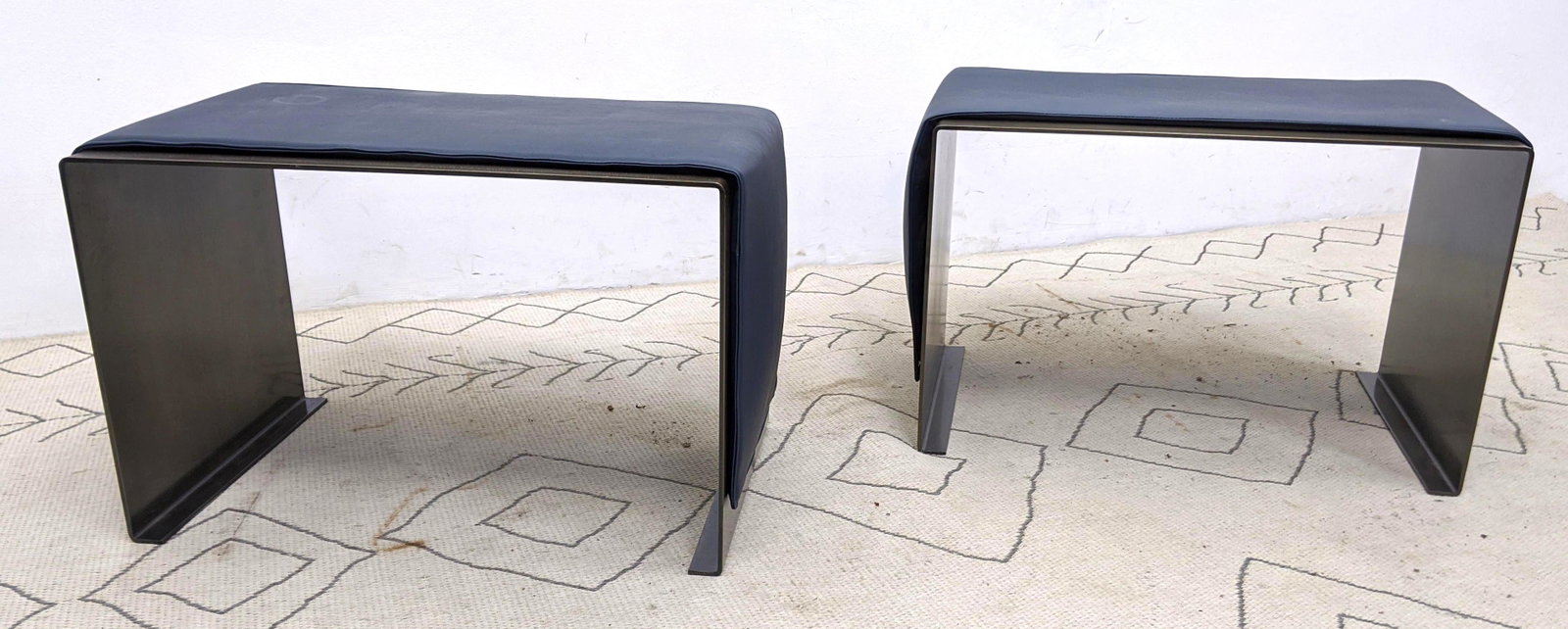 Pair Decorator Modern Steel Benches Stools with Magneti: Pair Decorator Modern Steel Benches Stools with Magnetic Leather cushions. Gun metal and blue. -- Dimensions: H: 18 inches: W: 28 inches: D: 18.5 inches ---