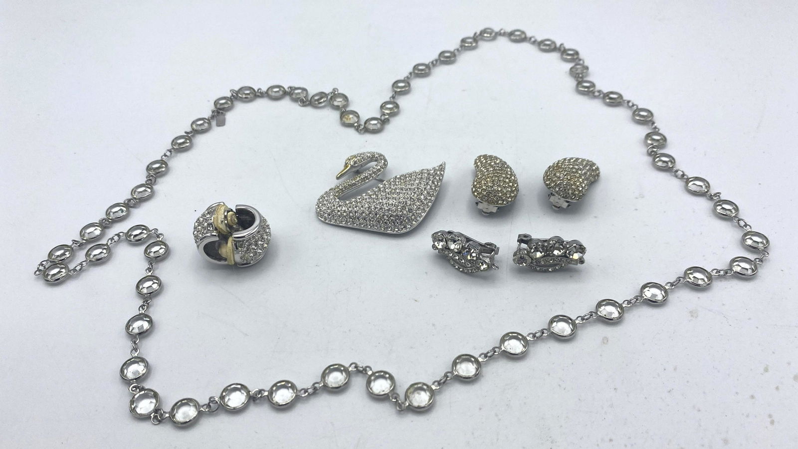 Costume Jewelry Lot. CINER, SWAROVSKI, And EISENBERG.: Costume Jewelry Lot. CINER, SWAROVSKI, And EISENBERG.-- Dimensions: H: 2 inches: W: 1.5 inches: D: .25 inches --- US Shipping charge: $15 Plus insurance at a rate of $1 per hundred.