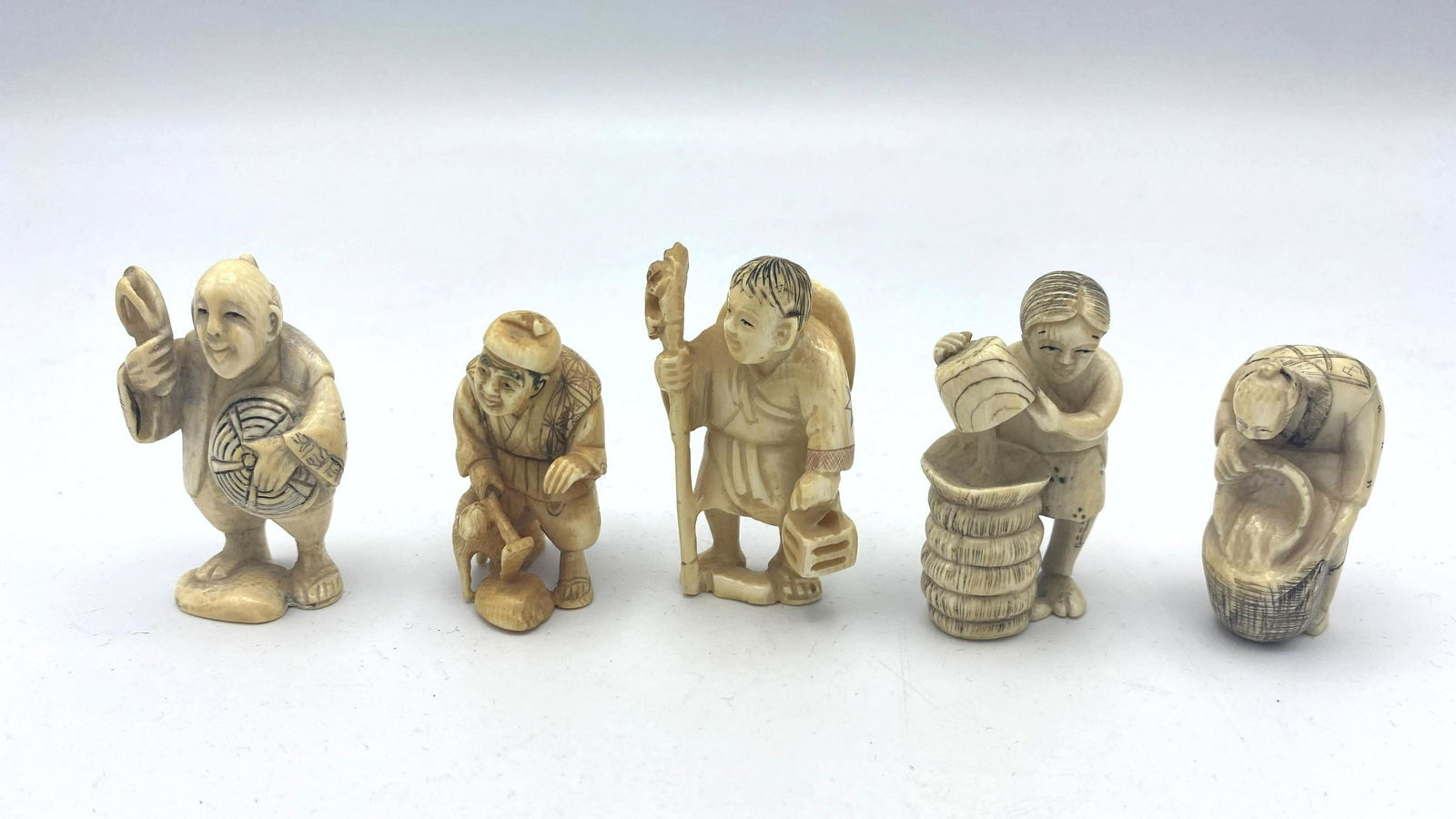 5 Small Figural Japanese Carvings. (1 of 3)