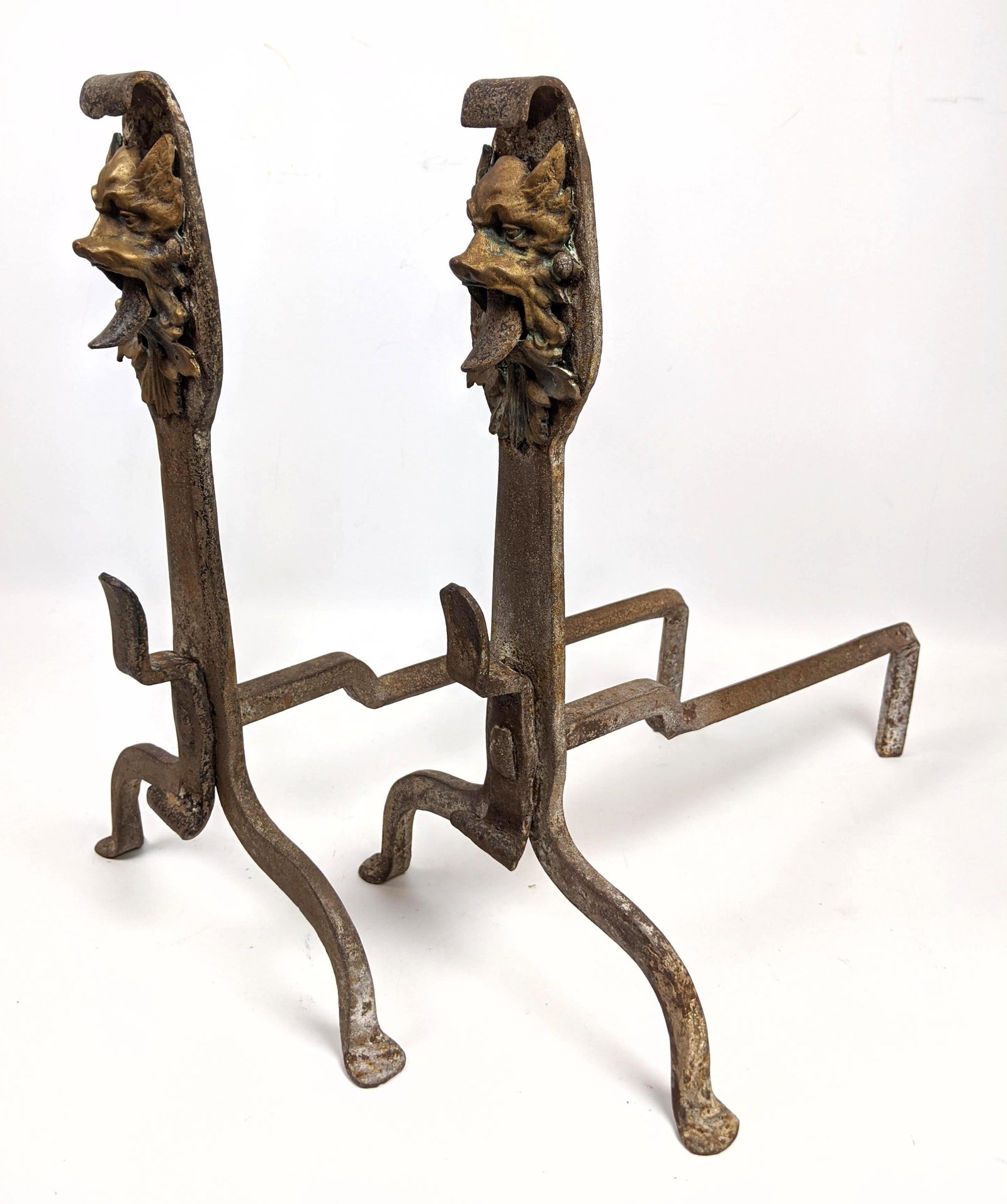 Pair Gothic Andirons. with Griffin Heads. Iron and Bras: Pair Gothic Andirons. with Griffin Heads. Iron and Brass.-- Dimensions: H: 17 inches: W: 10 inches: D: 15 inches --- US Shipping charge: In house shipping available. Will be calculated once destinatio