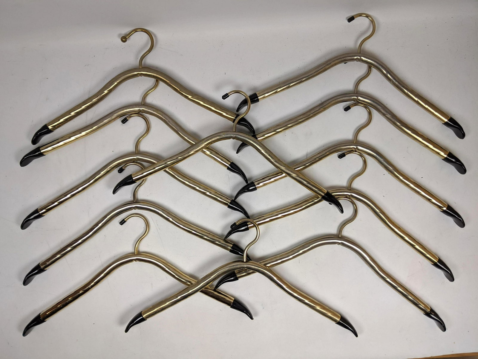 Set 12 Gold Tone Mid Century Modern Hangers. Italian St: Set 12 Gold Tone Mid Century Modern Hangers. Italian Style.-- Dimensions: H: 18 inches: W: 10 inches: D: 1 inches ---