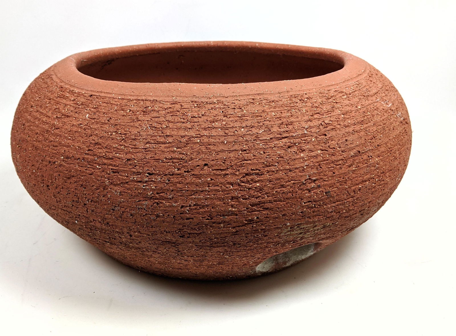 Stan Bitters Pottery Garden Hose Holder. Marked: Stan Bitters Pottery Garden Hose Holder. Incised Mark-- Dimensions: H: 8 inches: W: 18 inches: D: 18 inches ---