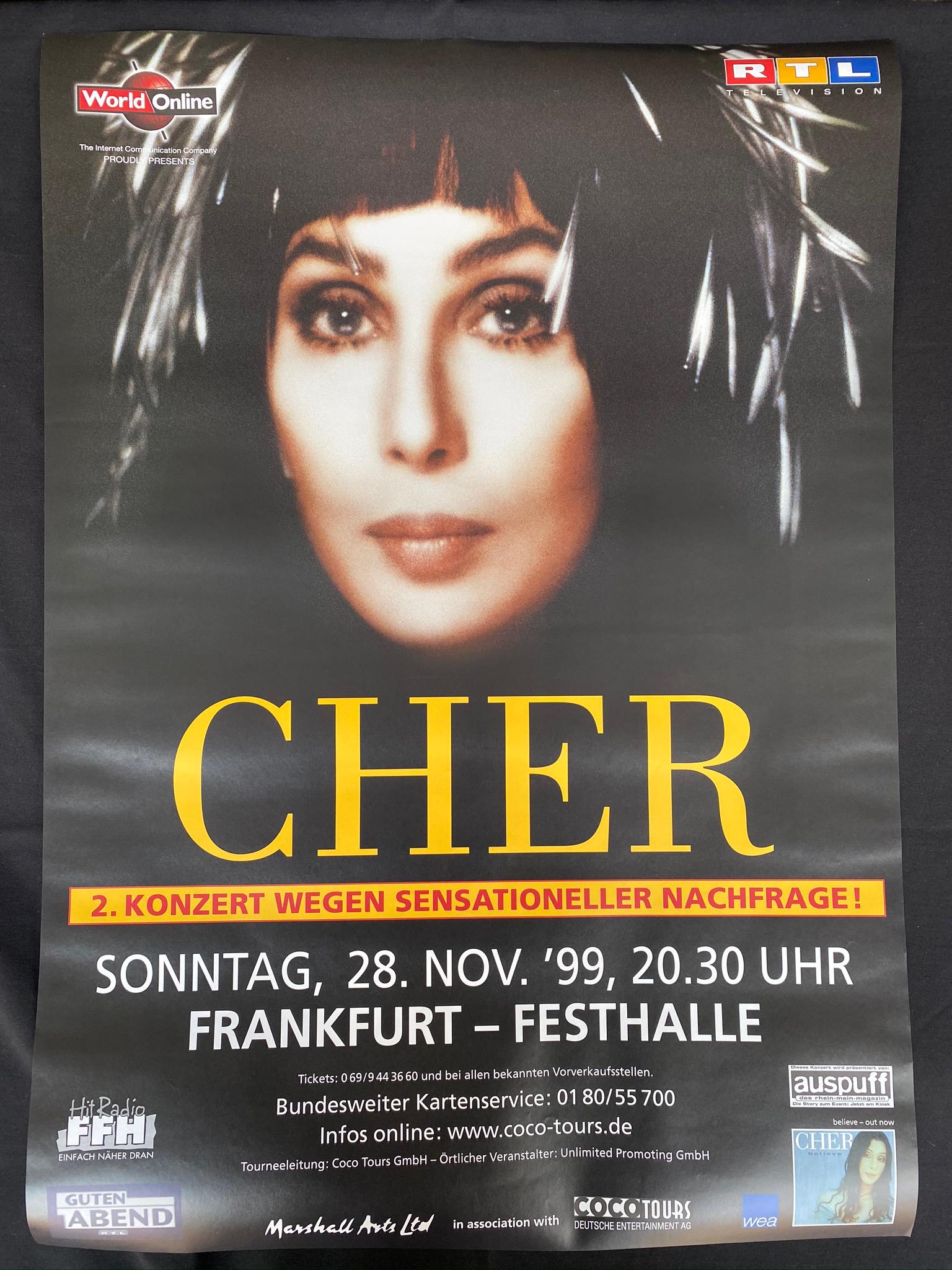 Cher November 28 1999 Frankfurt Germany Venue Concert P: Cher November 28 1999 Frankfurt Germany Venue Concert Poster -- Dimensions: H: 32 7/8 x 23 1/4 inches --- Bidding note: We will be attempting to close these items at a rate of 2 items per minute. Due