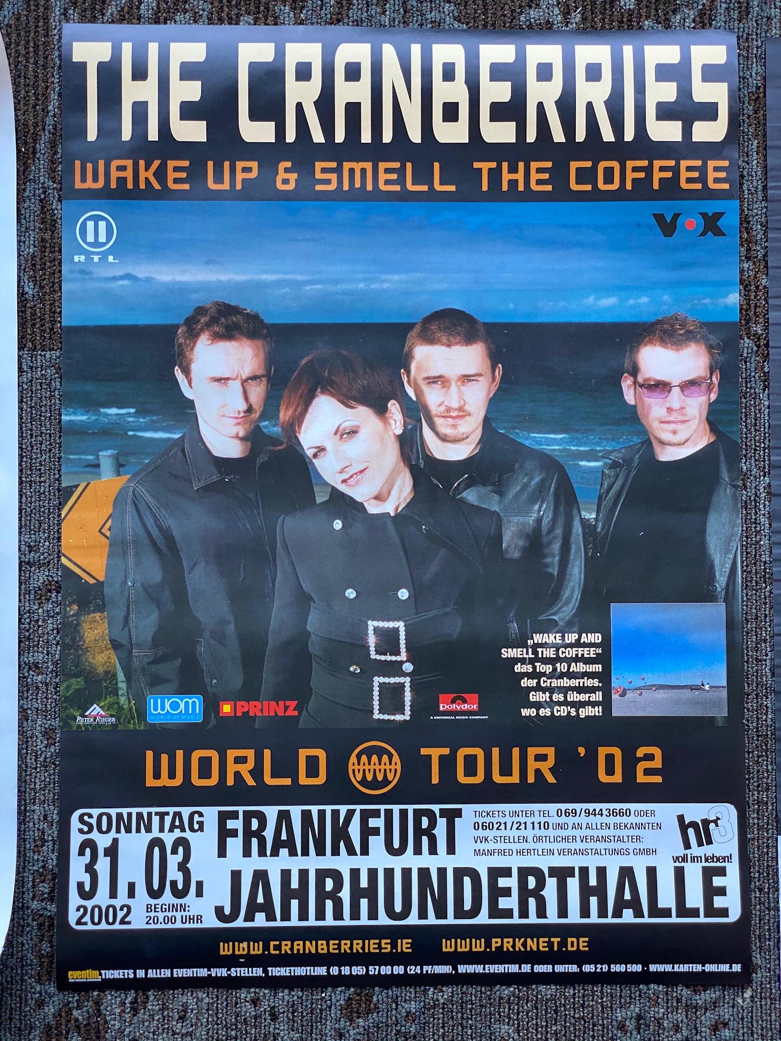 the Cranberries Wake Up and Smell the Coffee Frankfurt: the Cranberries Wake Up and Smell the Coffee Frankfurt Germany Venue Concert Poster World Tour 2002. -- Dimensions: H: 33 1/4 x 23 1/4 inches --- Bidding note: We will be attempting to close these ite