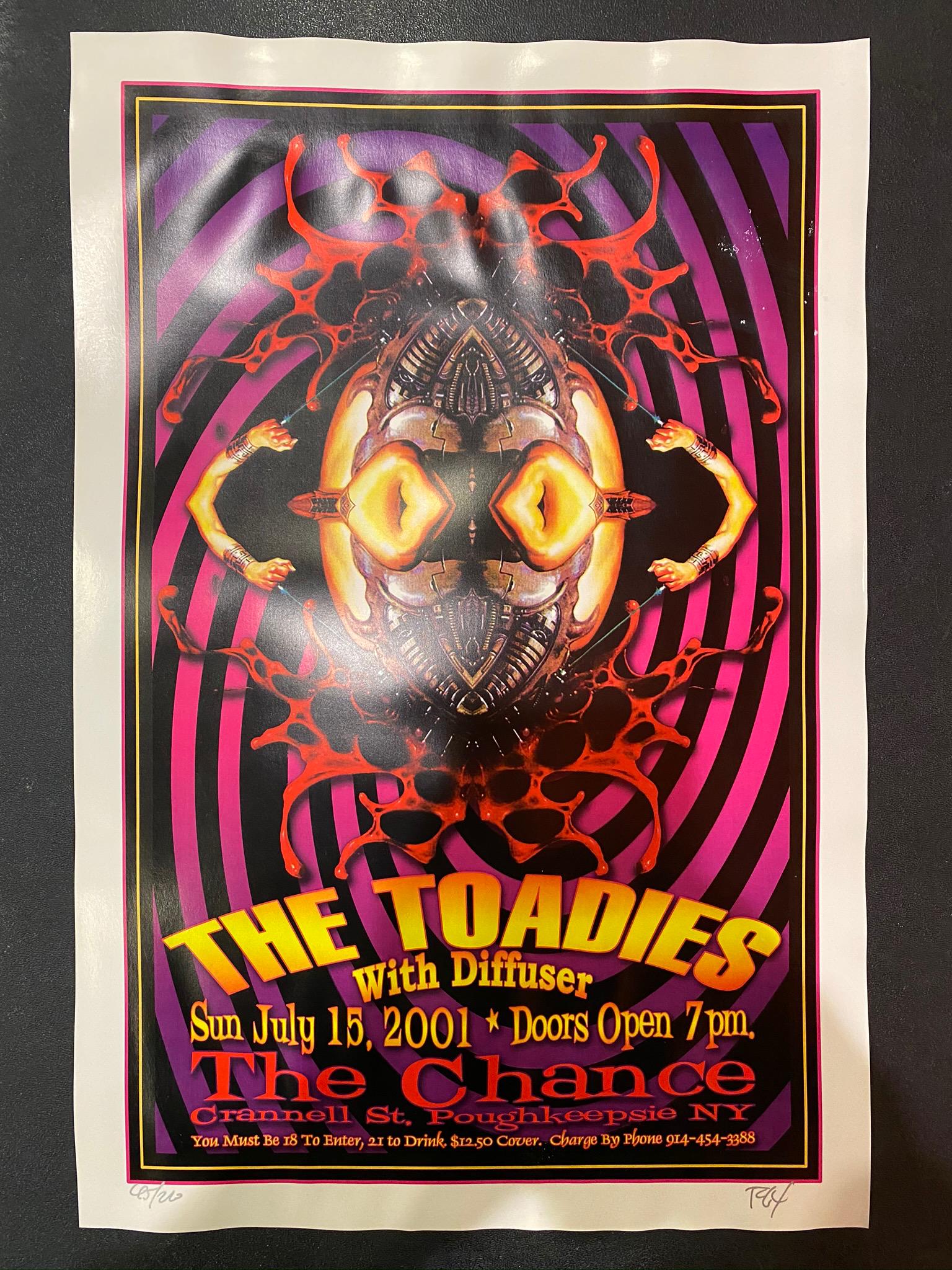 The Toadies Concert Poster July 15 2001 Artist Signed a: The Toadies Concert Poster July 15 2001 Artist Signed and Numbered -- Dimensions: H: 17 7/8 x 11 7/8 inches --- Bidding note: We will be attempting to close these items at a rate of 2 items per minute