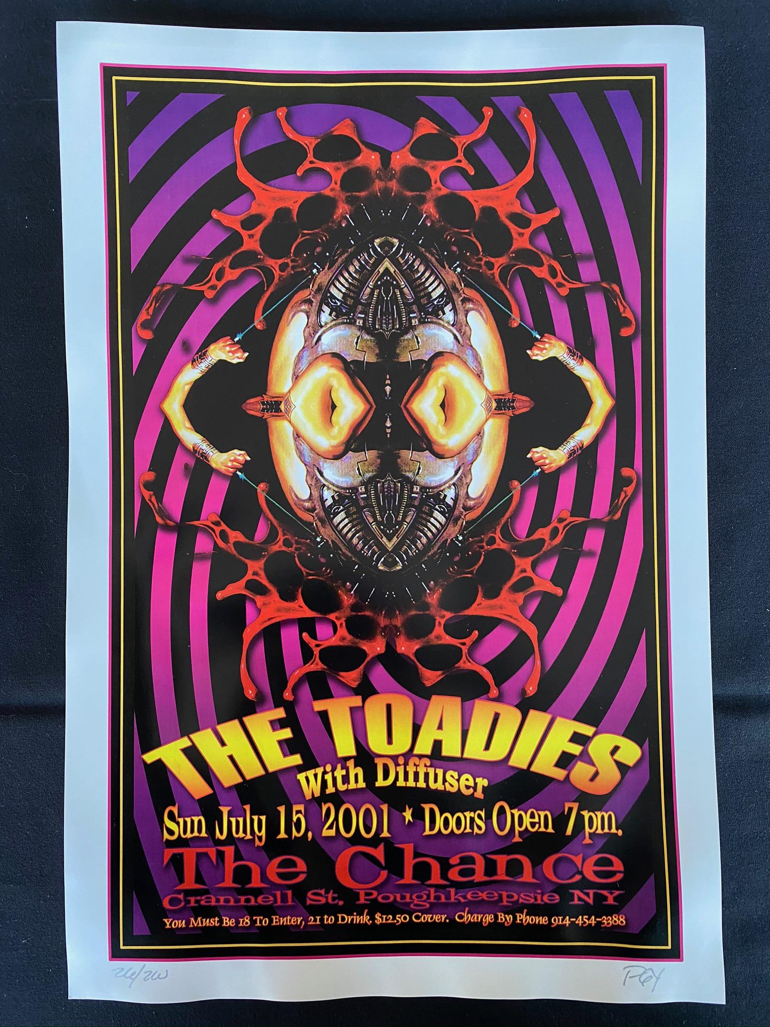 The Toadies Concert Poster July 15 2001 Signed by the A: The Toadies Concert Poster July 15 2001 Signed by the Artist In Numbered -- Dimensions: H: 17 7/8 x 11 3/4 inches --- Bidding note: We will be attempting to close these items at a rate of 2 items per 