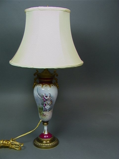 SEVRES style French Porcelain Painted Table Lamp.: SEVRES style French Porcelain Painted Table Lamp. Bronze Mounts. Handpainted Courting Scene. Signed. Dimensions: H: 25 inches: W: 12 inches Condition (General) Please contact us with specific question
