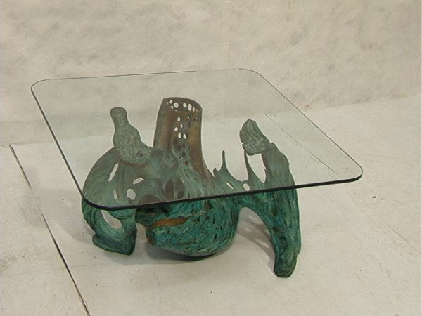 Bob Bennett Abstract Bronze Coffee Cocktail Table: Bob Bennett Abstract Bronze Coffee Cocktail Table. Square glass top on heavy bronze base. Unsigned. 1/2" glass. Dimensions: H: 16.25 inches: W: 35.75 inches: D: 36 inches Weight and size WITHOUT THE G