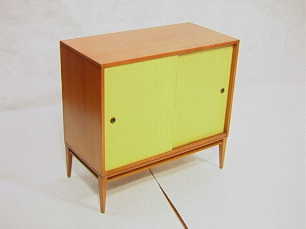Paul McCobb Mc Cobb Two Door Cabinet Planner Grou: Paul McCobb Mc Cobb Two Door Cabinet Planner Group. Maple with yellow sliding doors. Dimensions: H: 33.5 inches: W: 36 inches: D: 18 inches Condition (General) Please contact us with specific question