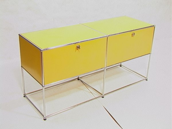 Herman Miller Steel and Chrome Credenza Cabinet.: Herman Miller Steel and Chrome Credenza Cabinet. Tube Chrome with Yellow enameled steel panels. Wood Doors. Has Original Key. Dimensions: H: 29 inches: W: 20.5 inches: D: 60 inches Condition (General)