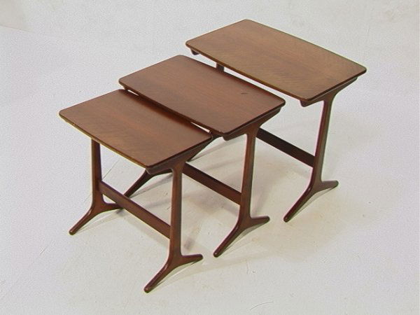 Selig Danish Modern Walnut Nesting Tables. Arche: Selig Danish Modern Walnut Nesting Tables. Arched Legs. Dimensions: H: 20 inches: W: 22.75 inches: D: 15 inches Condition (General) Please contact us with specific questions about condition, not visib